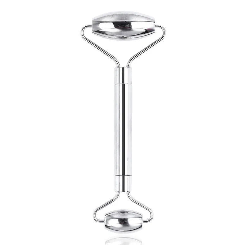 Stainless steel heart-shaped facial eye roller and double-headed massage scraping board set.