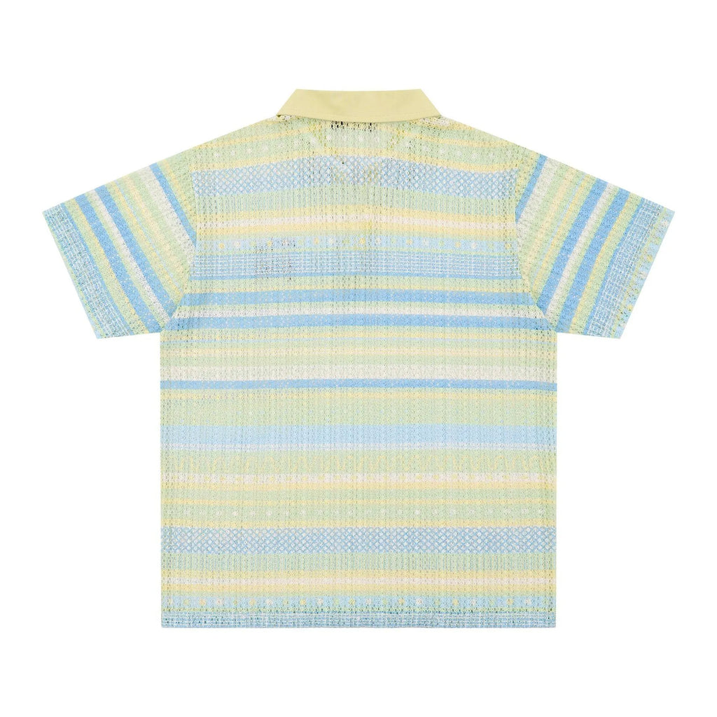 Man wearing a blue printed short sleeve shirt with a loose casual fit.