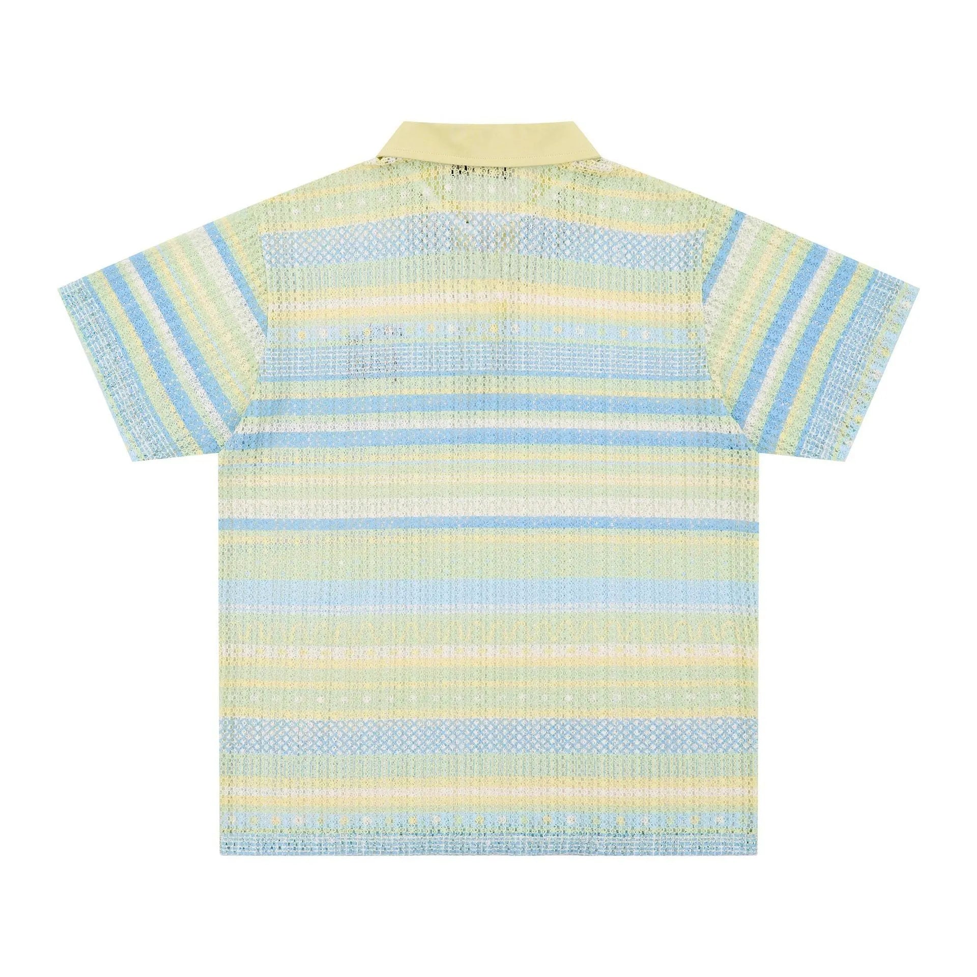Man wearing a blue printed short sleeve shirt with a loose casual fit.