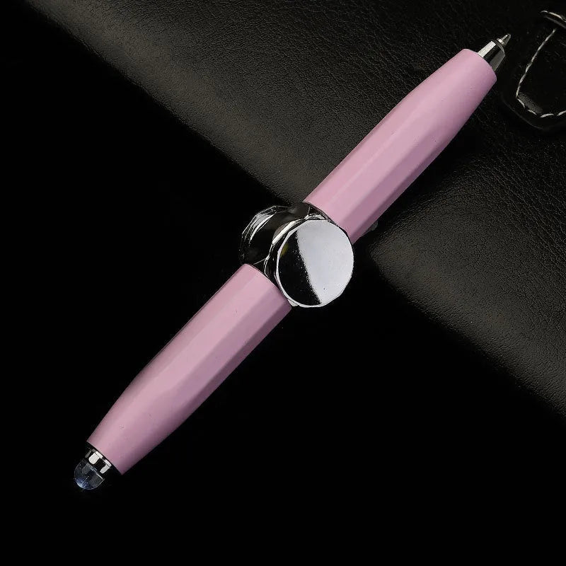 Metal gyro spinner ballpoint pen showing writing tip and spinning mechanism with LED lights