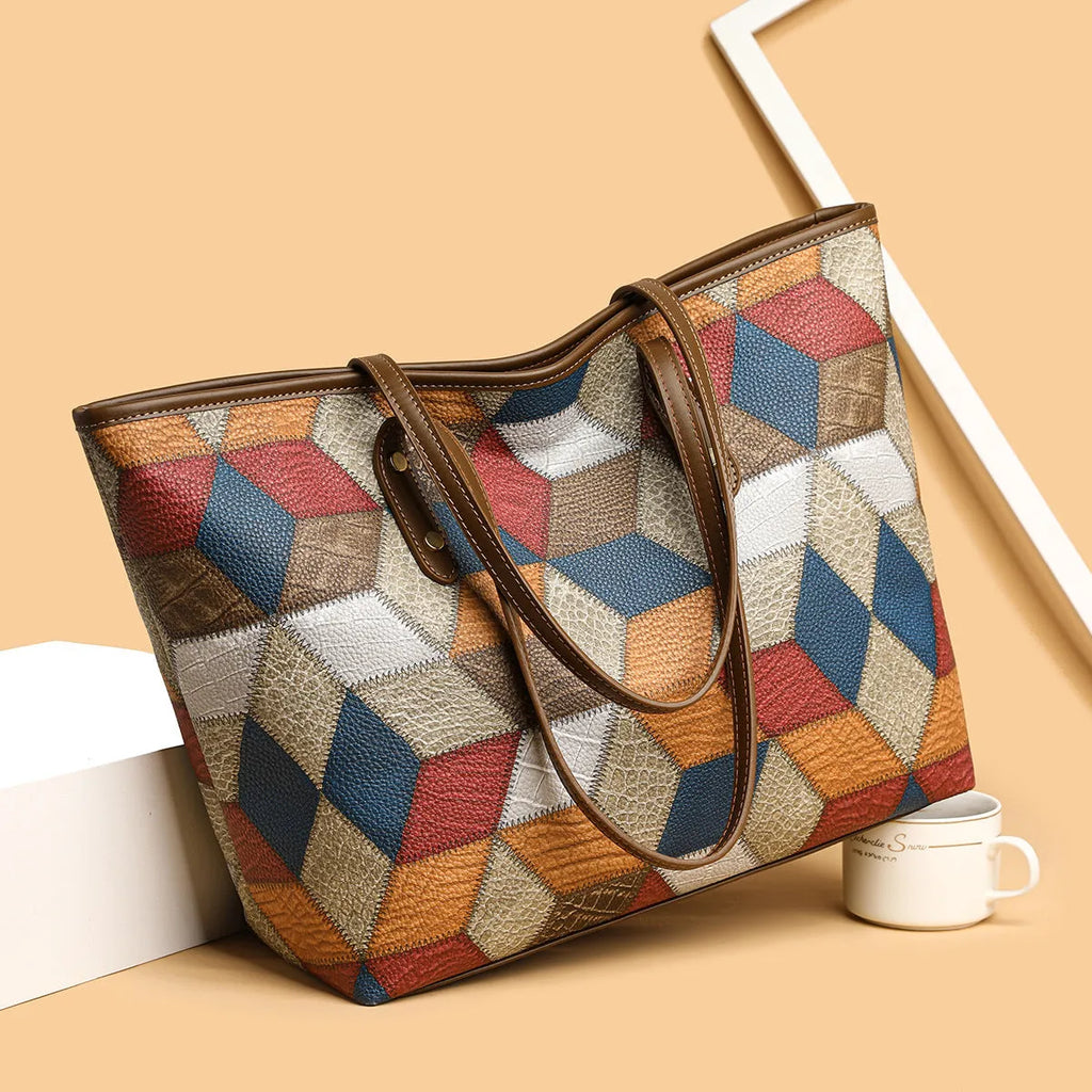 Women's large capacity PVC handbag in blue brown colour with sandwich pocket outer design