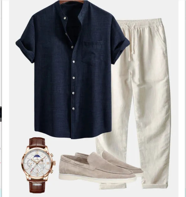 Men's blue slim-fit short-sleeved shirt with stand collar, part of a set with trousers, shoes, and watch