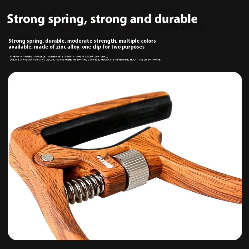 Aroma Capo AC-30 guitar capo in silver or wood grain colour, zinc alloy and silicone, with tuning clip