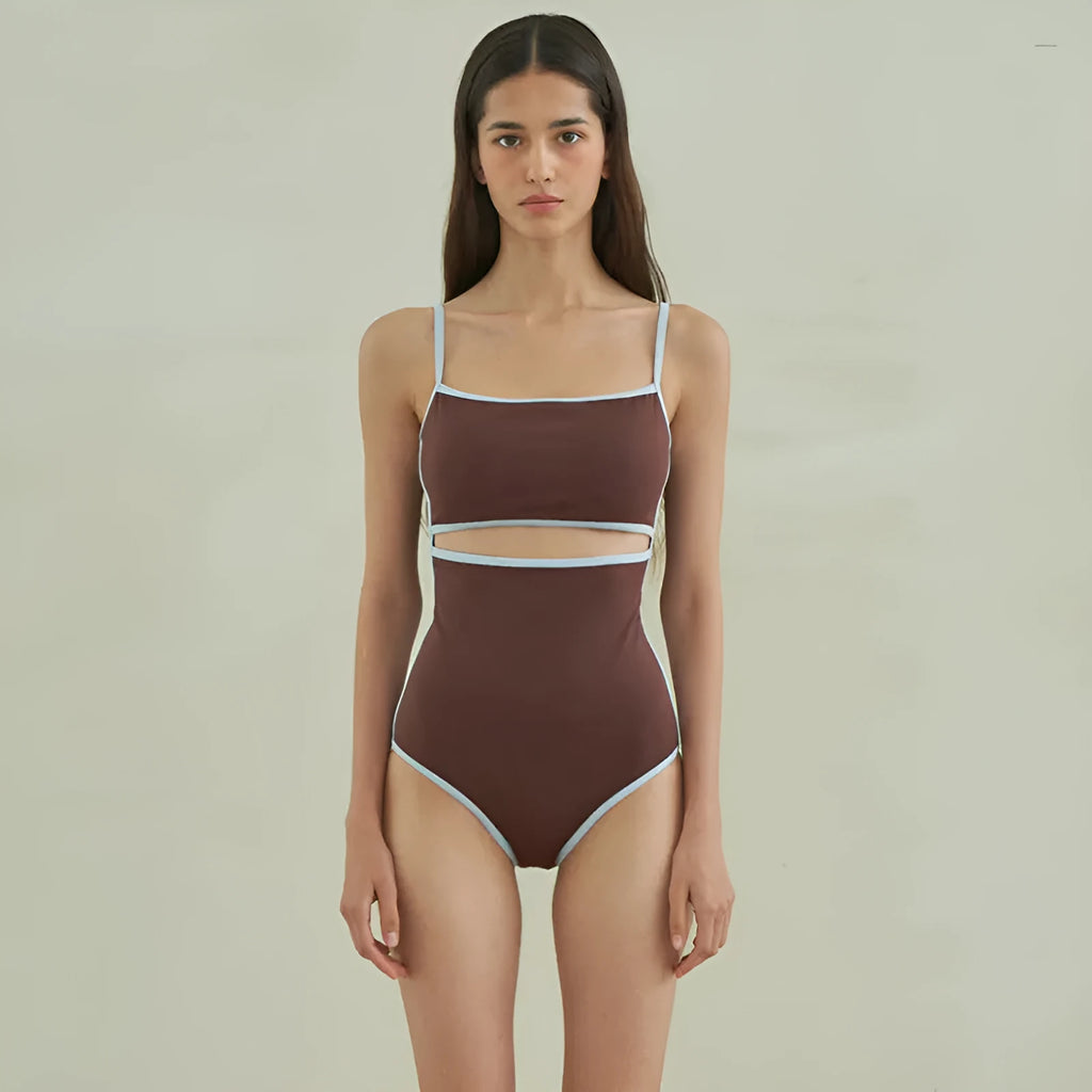Brown women's one-piece swimsuit with triangle halter neck on a mannequin.
