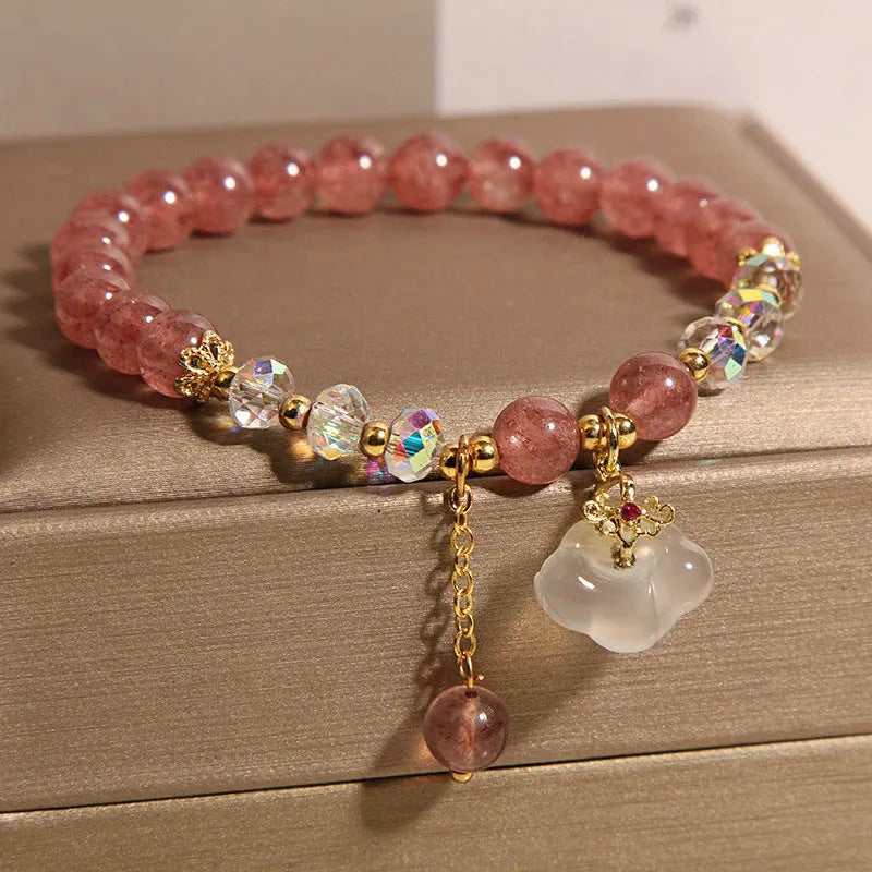 Women's natural bracelet with strawberry quartz, white agate beads, and auspicious cloud charms