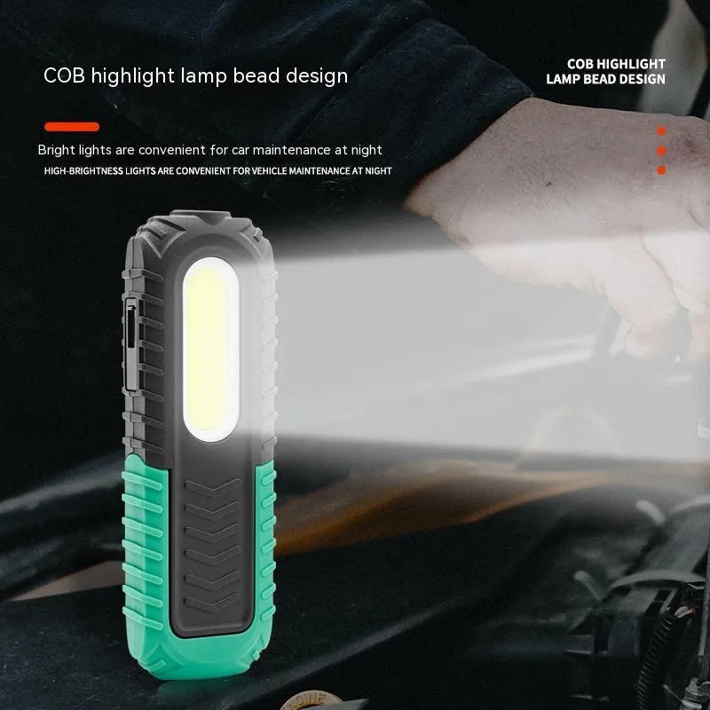 Black and green PET-coated auto repair work light with USB charging cable for vehicle inspection