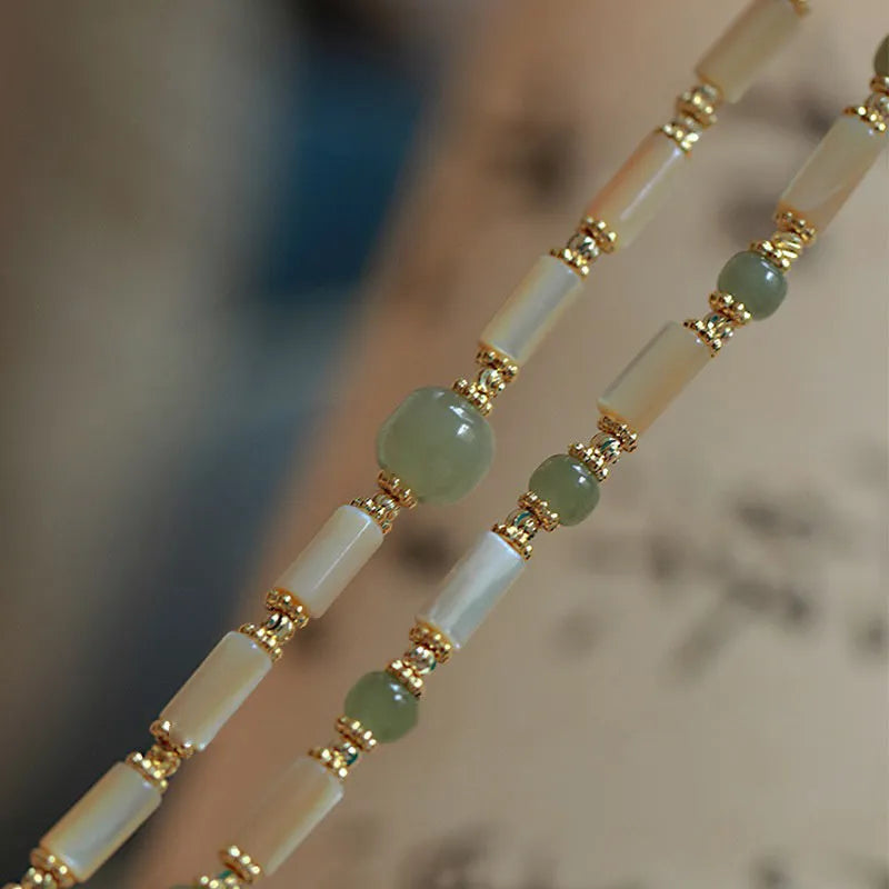 Women's Hetian jade bracelet with geometric round beads in simple design