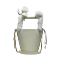 Women's PU messenger crossbody bag in black with urban simplicity style, placed on a flat surface