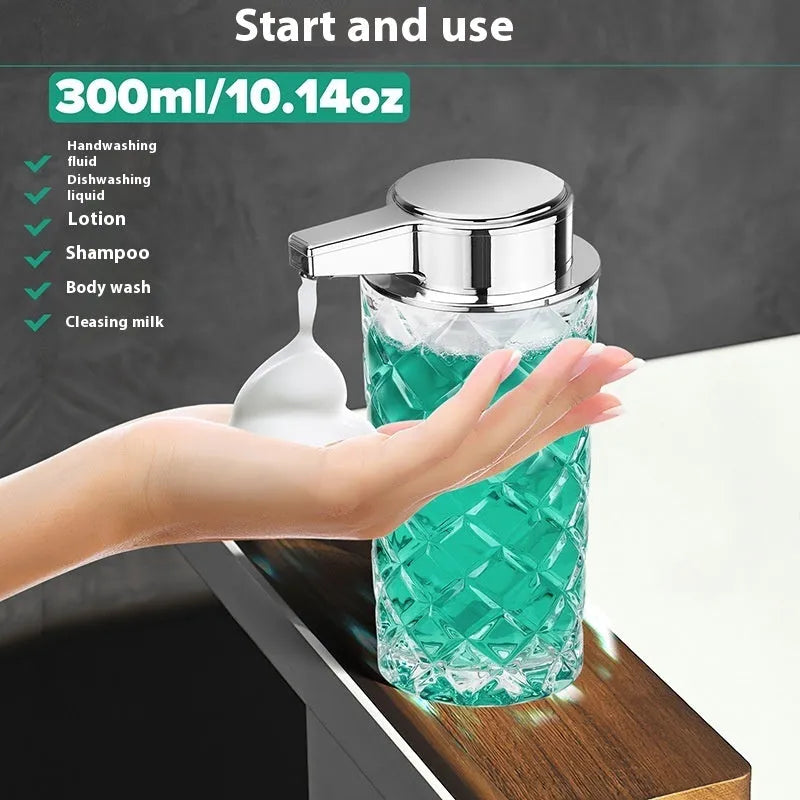 Silver automatic sensor soap dispenser with type-c charging port on a bathroom countertop.
