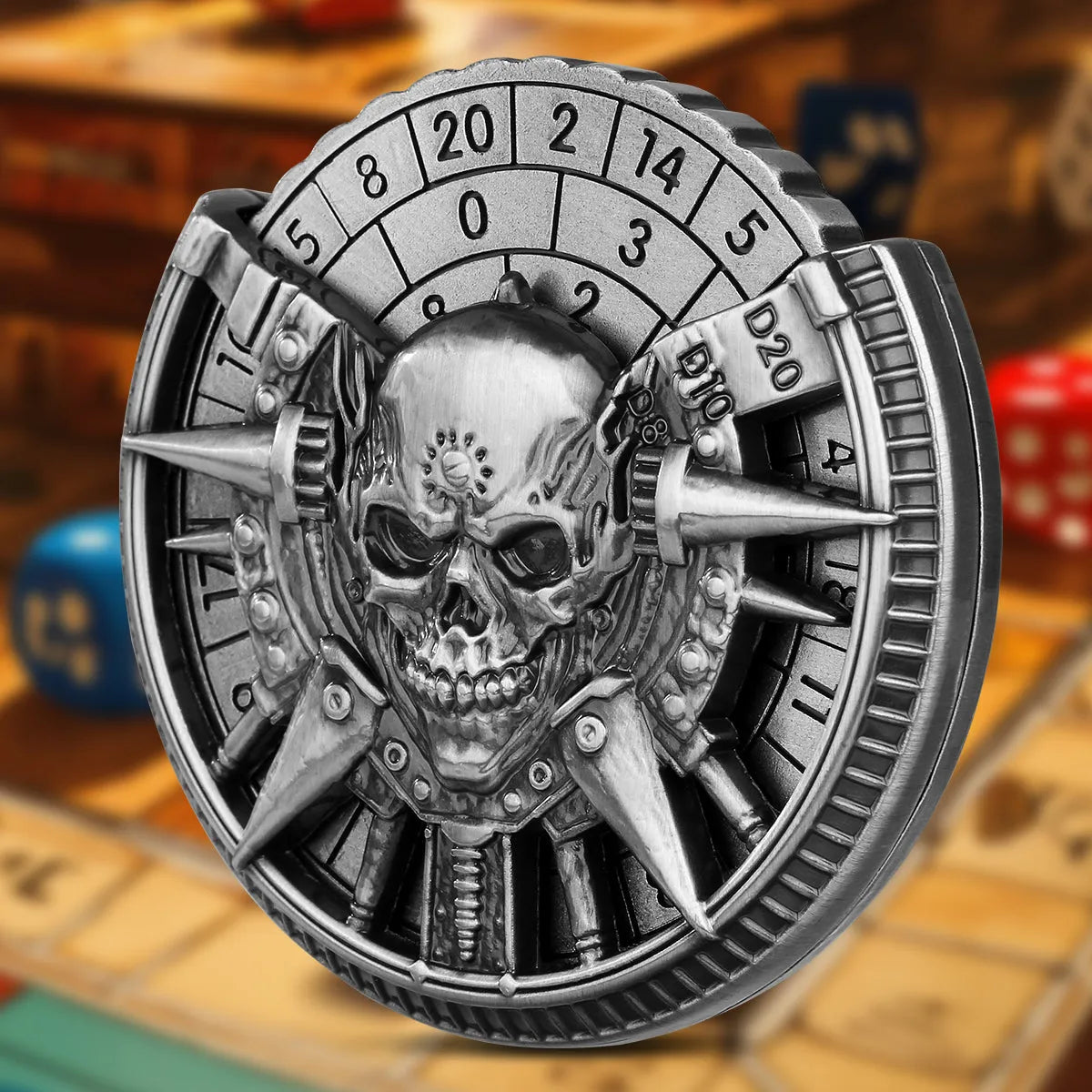 Skeleton metal wheel dice gift box with bronze D20 and D10 dice on a dark tabletop
