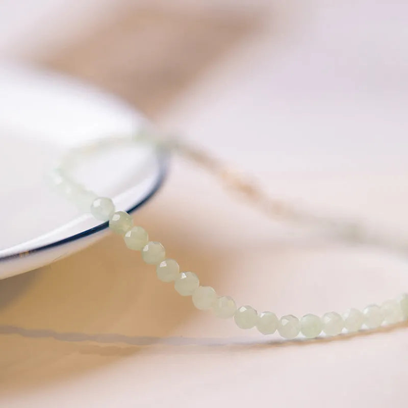 Women's Korean retro style jade bracelet with ball type design showing sizing options