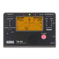TM-60 digital metronome in black or white plastic casing with display screen and control buttons