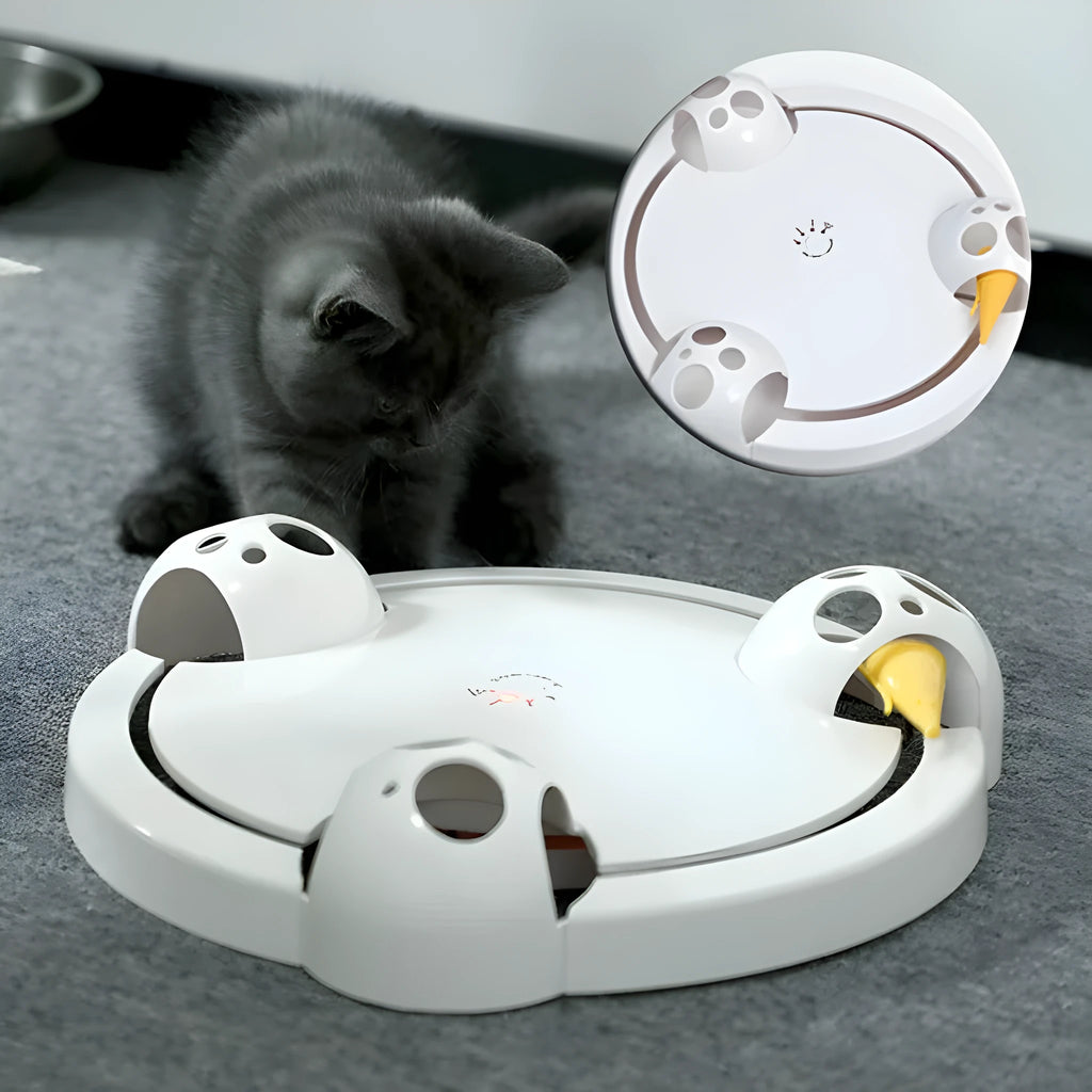 White electric cat turntable toy, 32cm diameter, with mouse-catching element on a flat floor