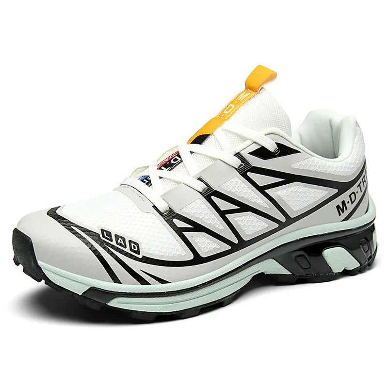 Low-top outdoor hiking shoes in artificial leather with mesh lining and rubber sole.
