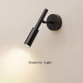 Modern wrought iron wall lamp in black with three-colour light source