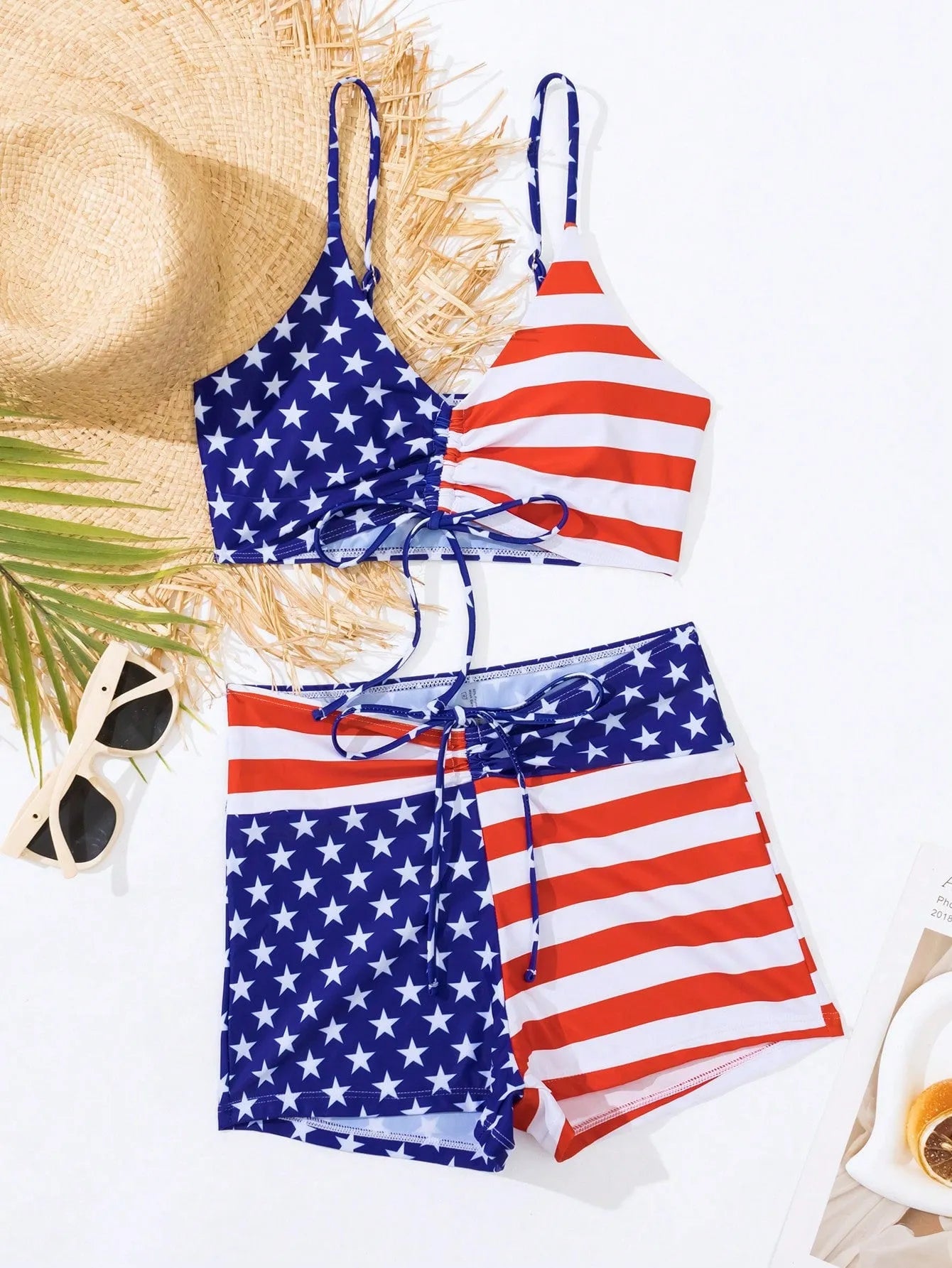 Women's high waist boxer style swimsuit with drawstring in red, white, and blue Stars and Stripes pattern