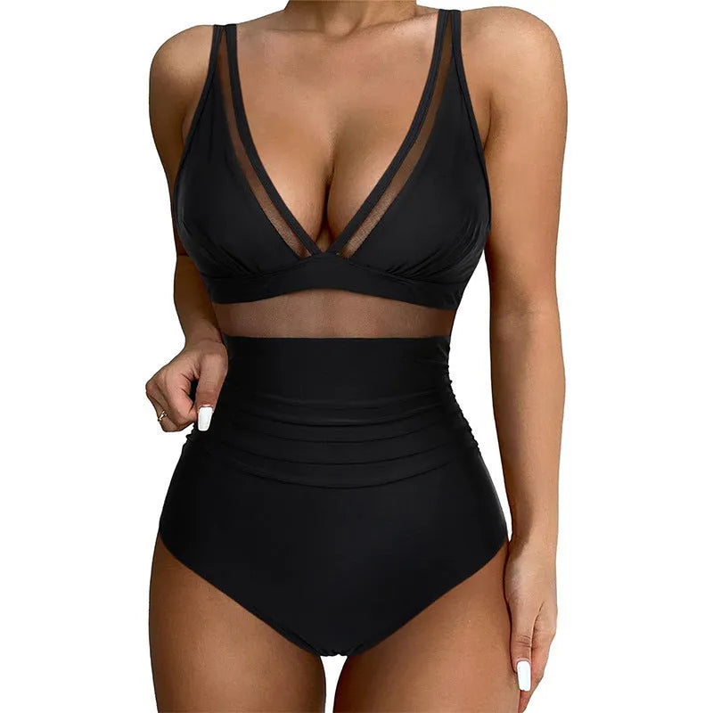 Black women's one-piece swimsuit with halter neck and briefs-style bottom made of nylon.