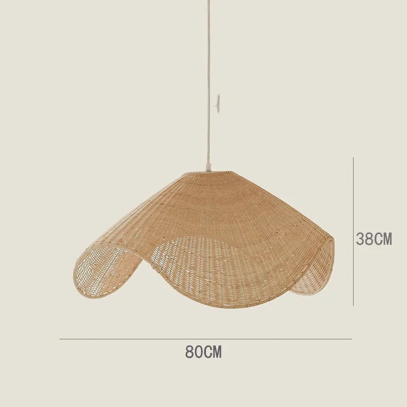 Handmade bamboo and rattan pendant ceiling lamp with a woven willow shade in warm white light.