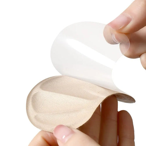 Three pairs of camel-coloured anti-blister heel cushion stickers with suede surface