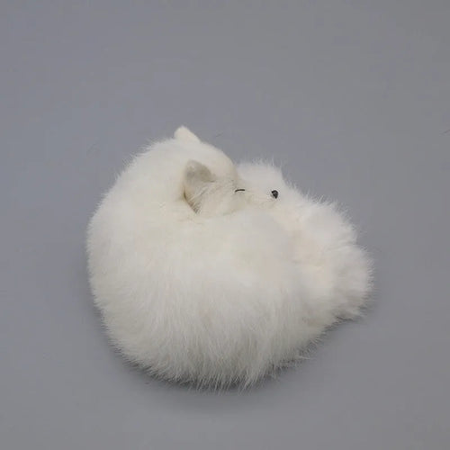 Artificial white fox fur handicraft decoration on a car dashboard, showing its 15cm size.