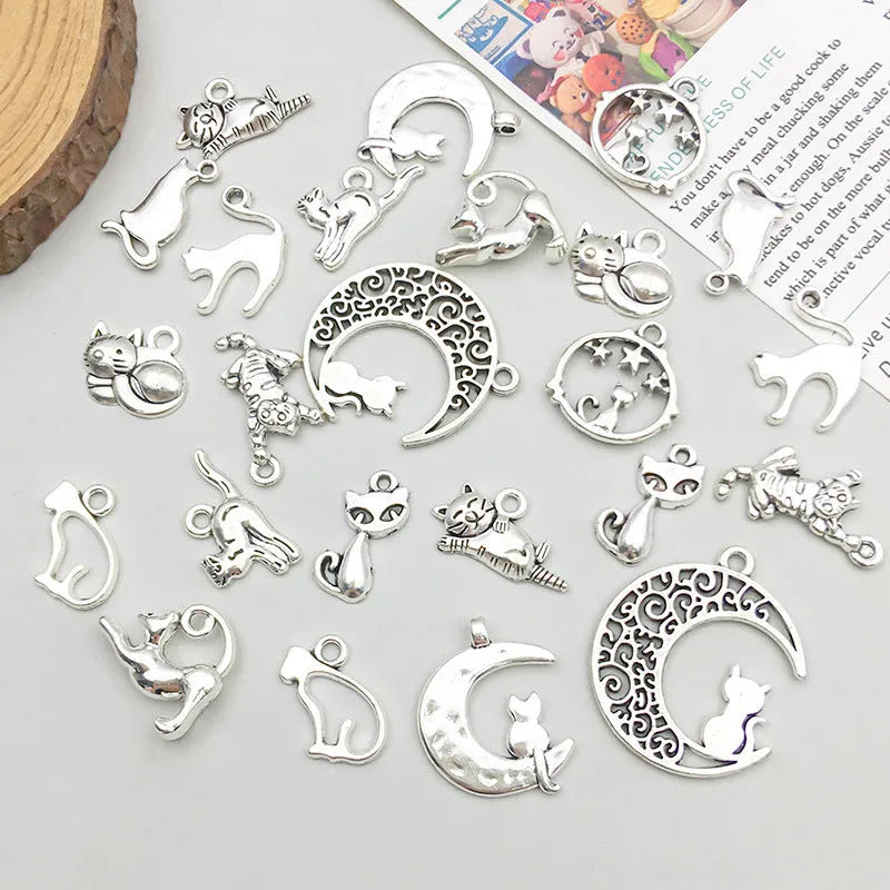 24 mixed ancient silver zinc alloy cat pendant charms with retro style on white background