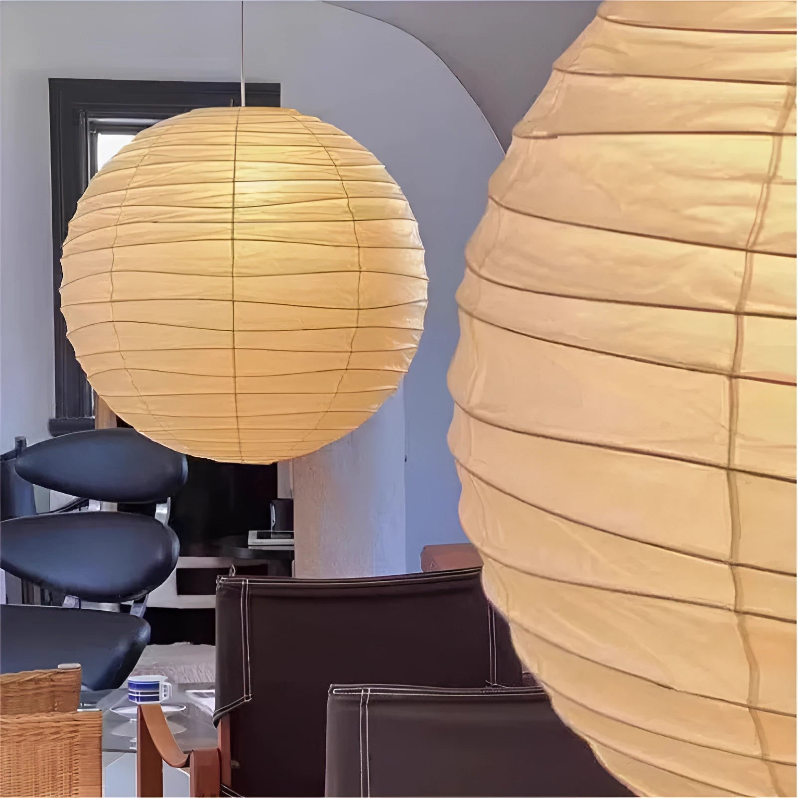 Japanese-style rice paper pendant chandelier in a living room setting.