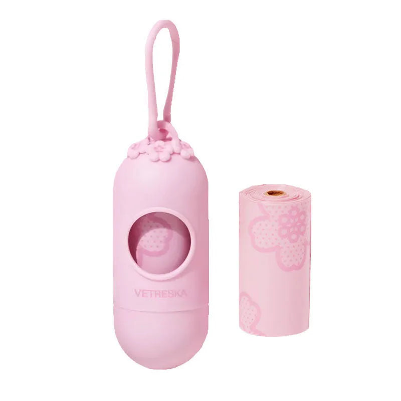 Portable dog poop picking bag capsule with scented inner bags in strawberry, orange and cherry blossom options