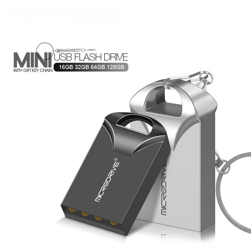 Small black and silver metal USB flash drive on a white background showing its compact size.