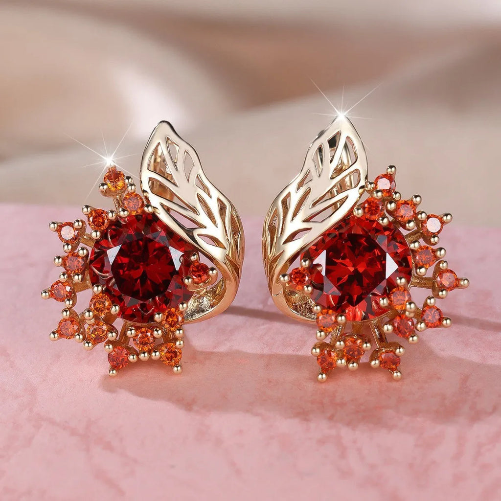 Round flower feather zircon drop earrings with champagne gold electroplate and coloured crystal settings.