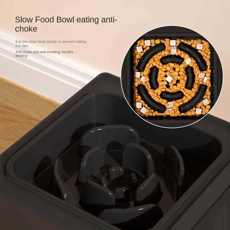 Adjustable dog bowl stand with stainless steel bowls in grey, set to middle height for a medium-sized dog
