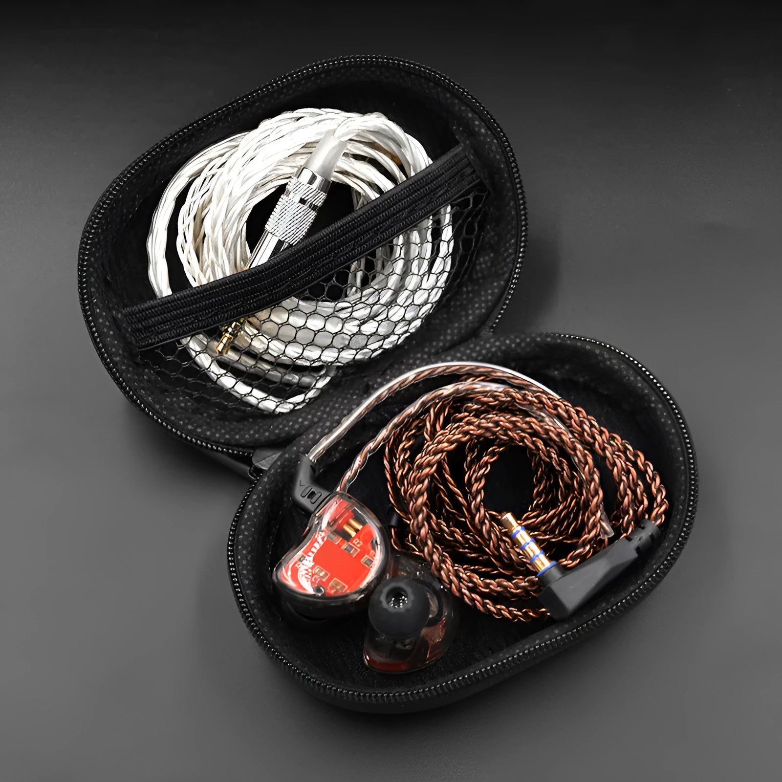 Black leather oval earphone storage bag for compatible headphones including EDX PRO and ZEX PRO models