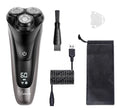 Black electric shaver with three rotating heads, pop-up sideburn trimmer, USB charging cable, and cleaning brush on a grey background.