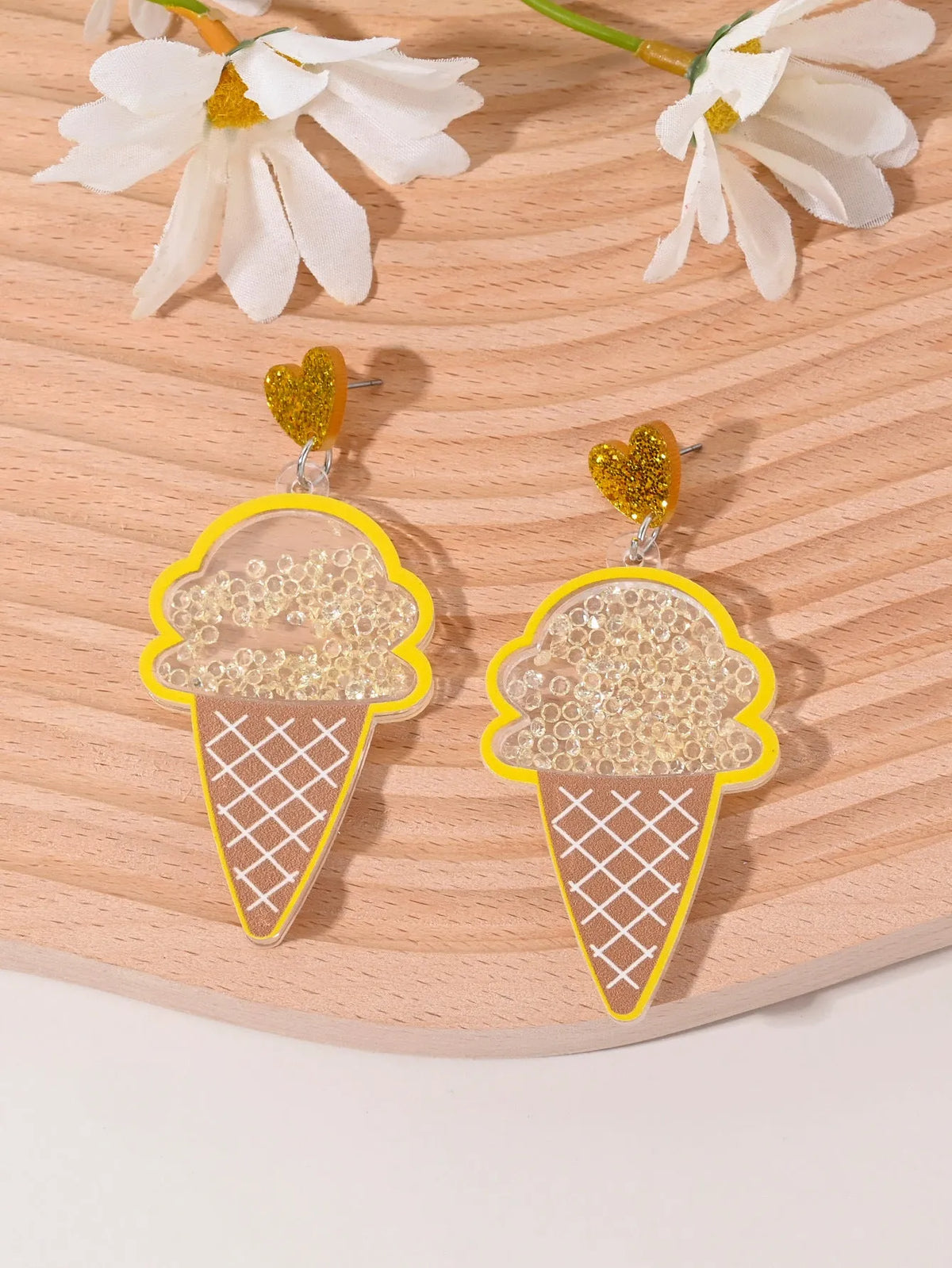 Colourful acrylic stud earrings with cherry, strawberry, watermelon, pineapple, coconut, cake, and ice cream designs.