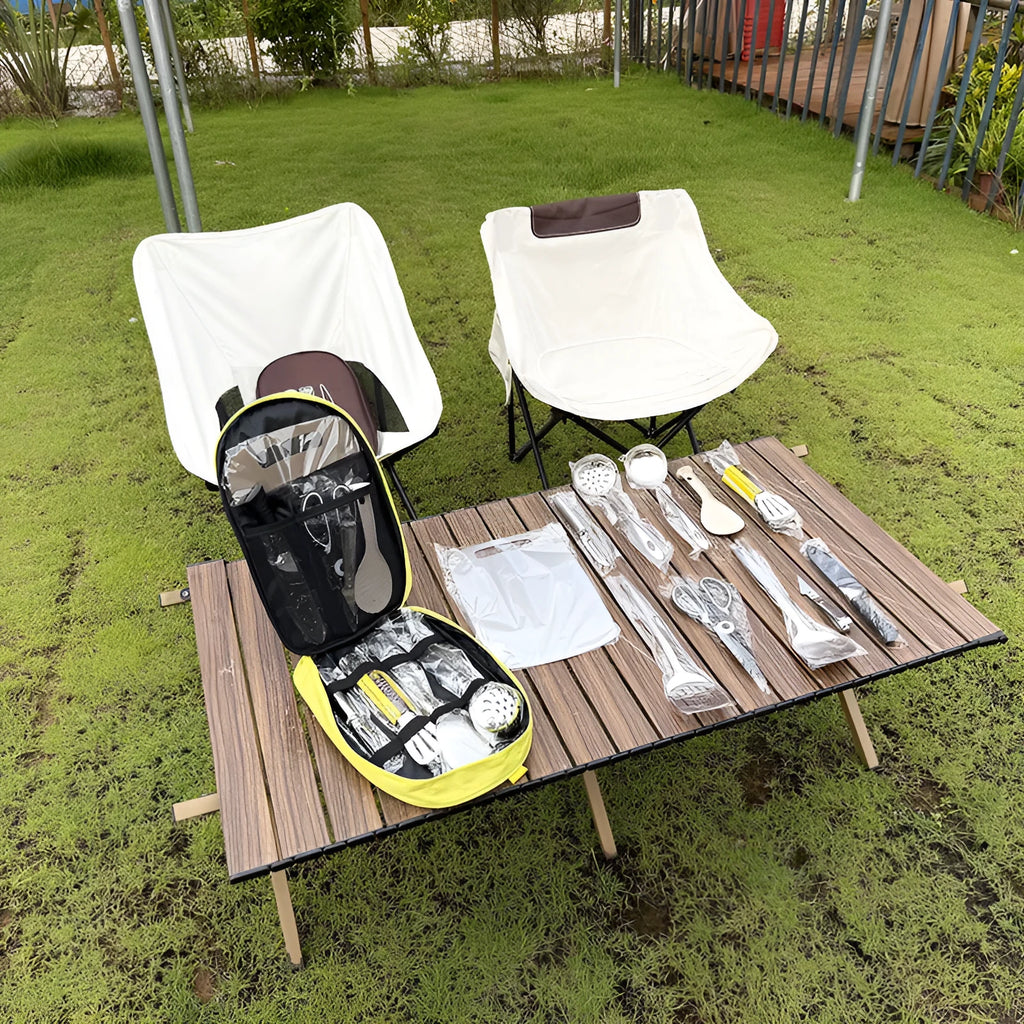 Portable khaki bag containing a 12-piece stainless steel picnic kitchenware set for outdoor dining.