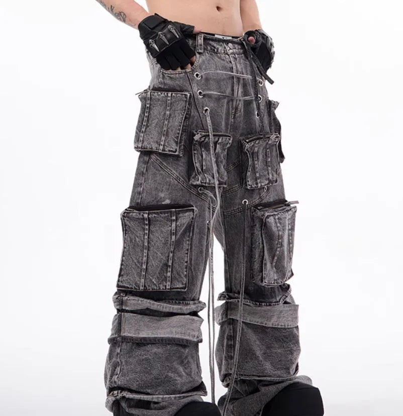 Grey distressed denim overalls with rope stitching and mop pant design