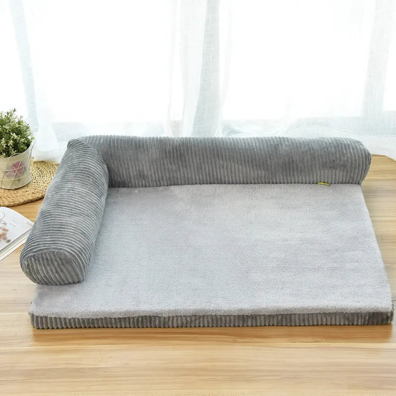 Corduroy dog sofa bed with bolster sides in grey colour on wooden floor