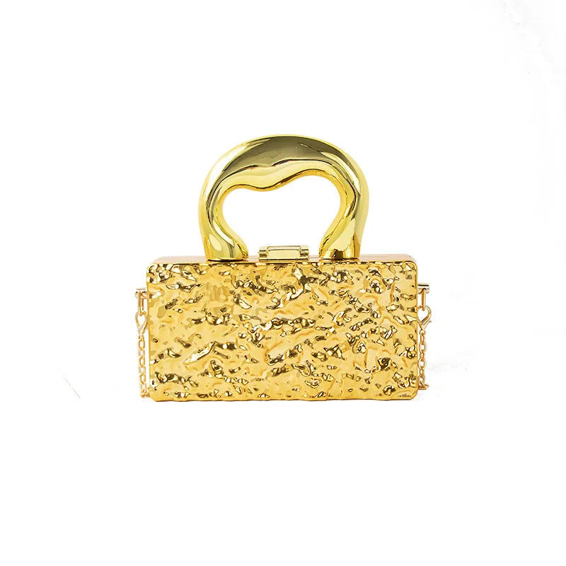 Mini crossbody bag with hard acrylic shell, chain strap, and phone pocket in Golden Ripples colour
