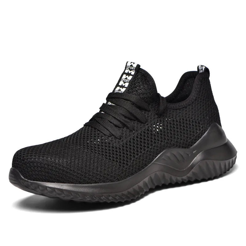 Men's black steel toe safety shoes with low-cut design on a work surface