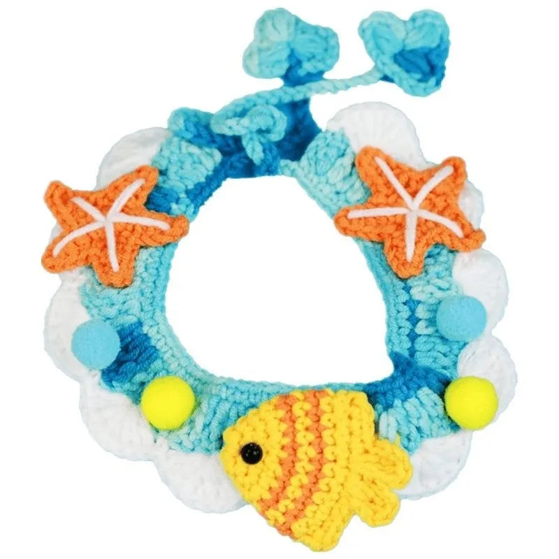Hand-woven wool cat collar with cartoon Underwater World pattern in blue, size example on a light background