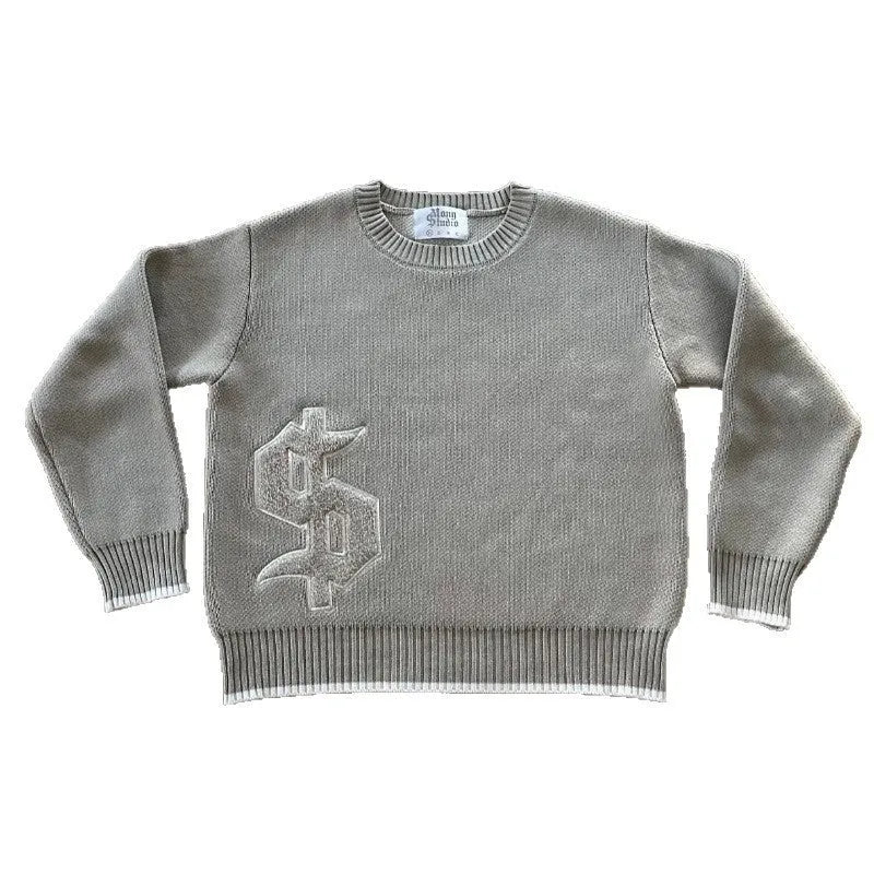 Grey loose-fitting long sleeve knitwear coat on a hanger.