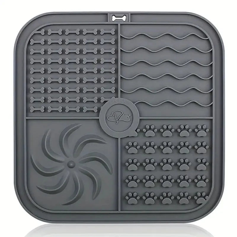 Silicone pet slow food mat with bottom suction cups in gray colour on smooth floor