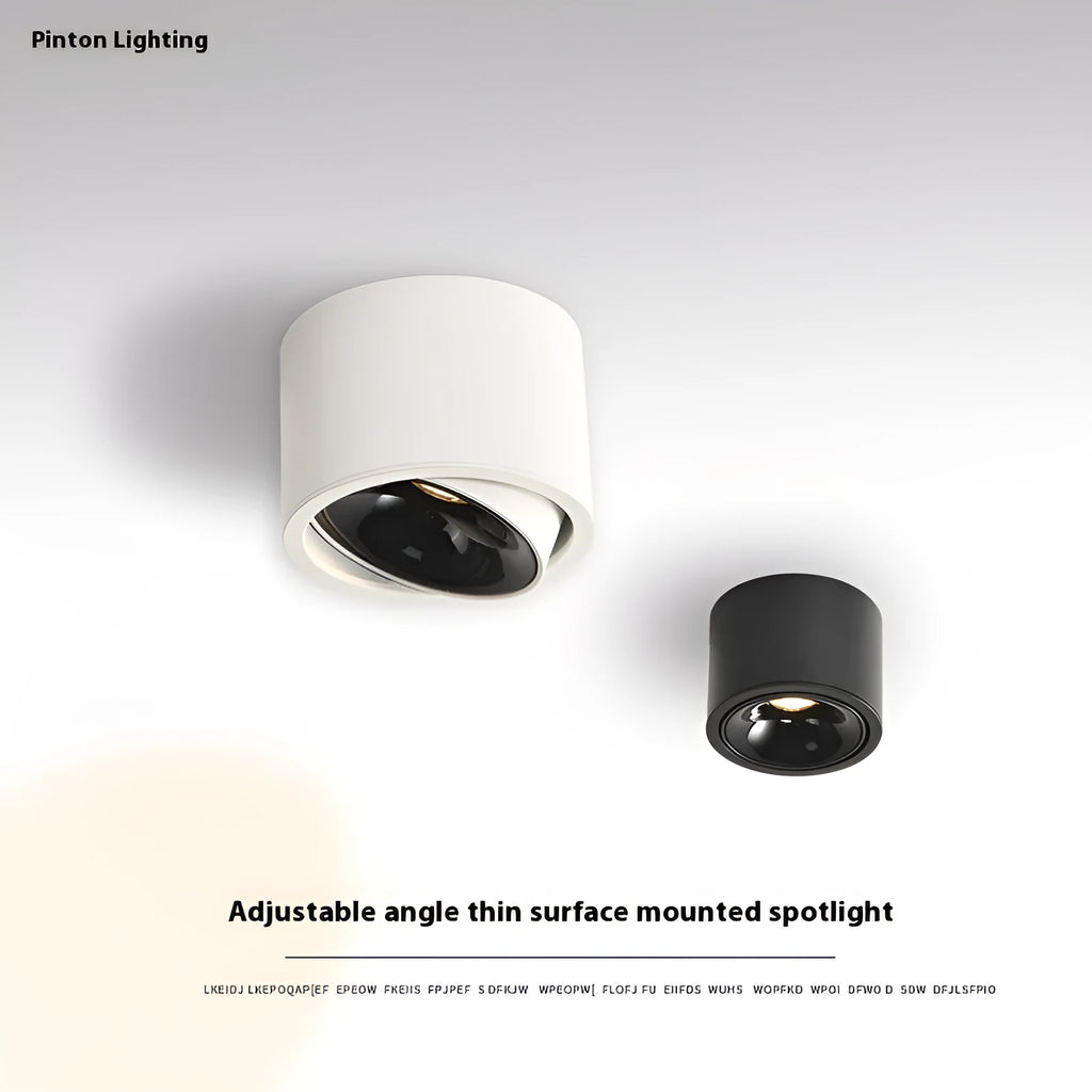 Round surface-mounted adjustable ultra-thin LED spotlight with aluminium housing, white finish, on ceiling