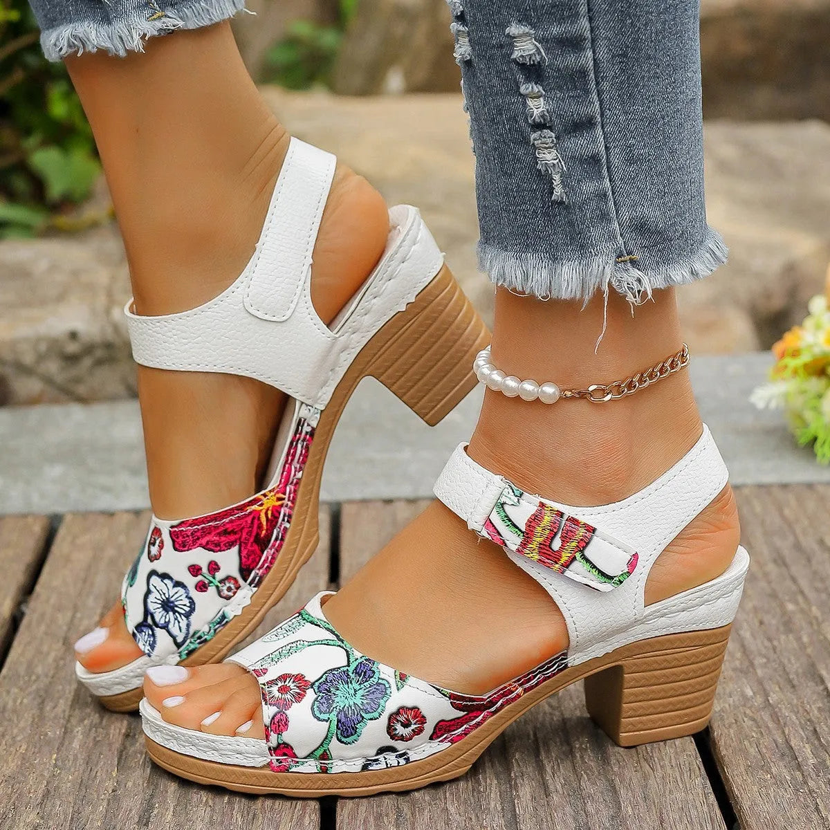 White women's casual sandals with high heel, Velcro buckle straps, and rubber sole.