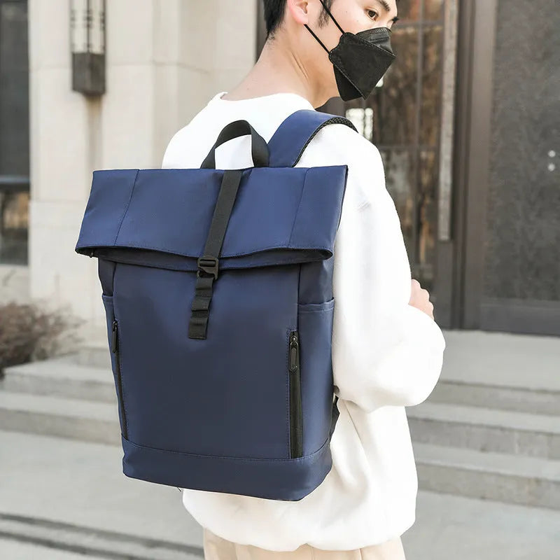 Men's nylon business leisure schoolbag in black, blue, or gray with waterproof breathable expansion and burden reduction.
