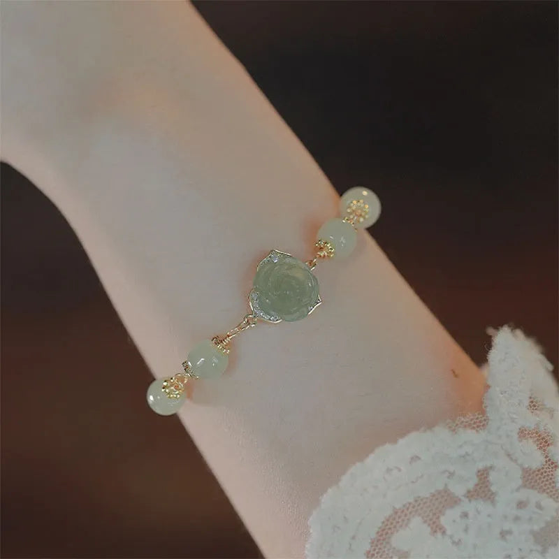 Original design women's bracelet in Hetian Jade Rose with 14K gold plating and a flower shape.