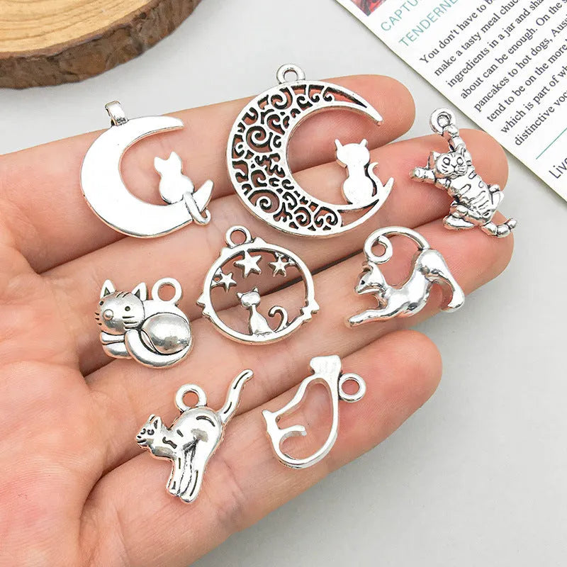 24 mixed ancient silver zinc alloy cat pendant charms with retro style on white background
