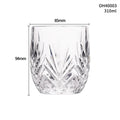 Thick bottom crystal whiskey shot glass in a selected colour style on a table.