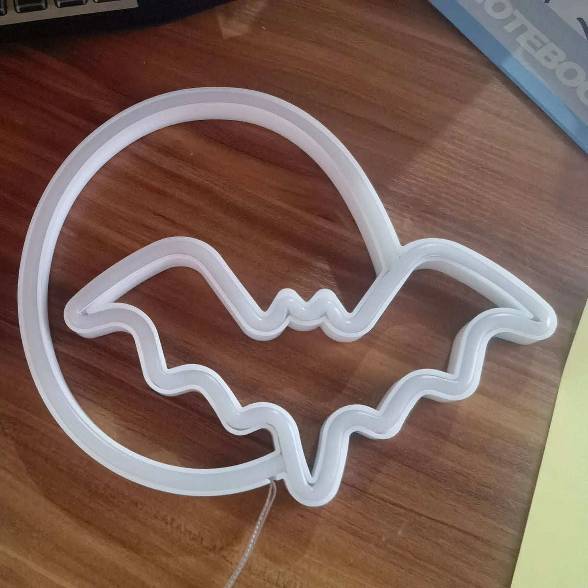 Halloween bat neon light in plastic shell with blue glow, 25cm wide, USB powered