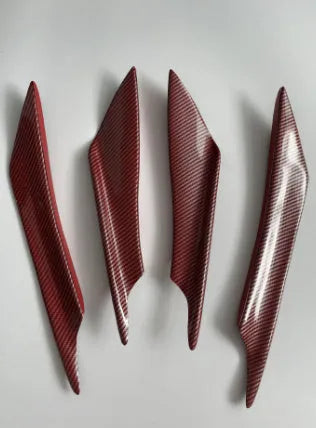Set of four ABS plastic automotive bumper spoiler air knives in carbon fibre finish