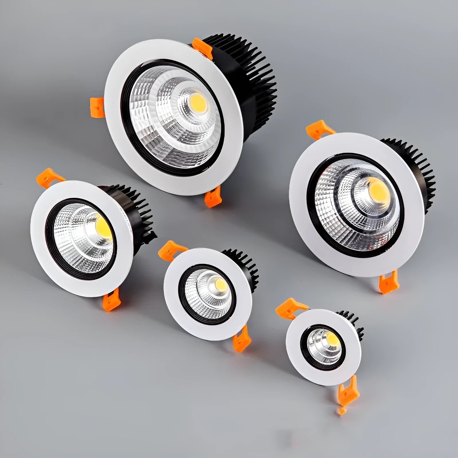White aluminium embedded LED ceiling spotlight with anti-glare design showing three colour temperature options